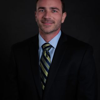 John McElroy, MD